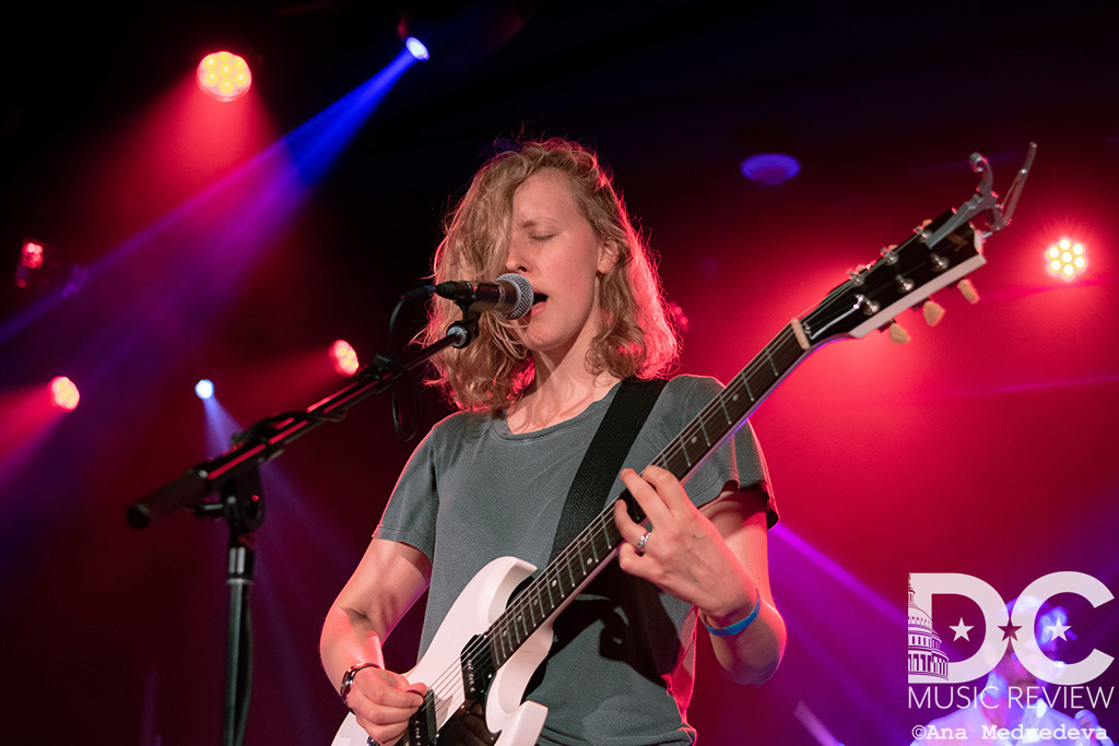 Kerry Alexander singing on stage