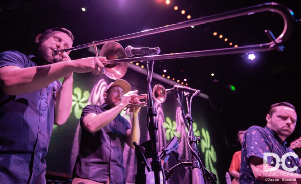 A truly powerful brass section flanks Kelly Finnigan.