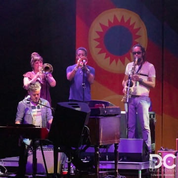 Tedeschi Trucks Band's fierce horn section beside Gabe Dixon