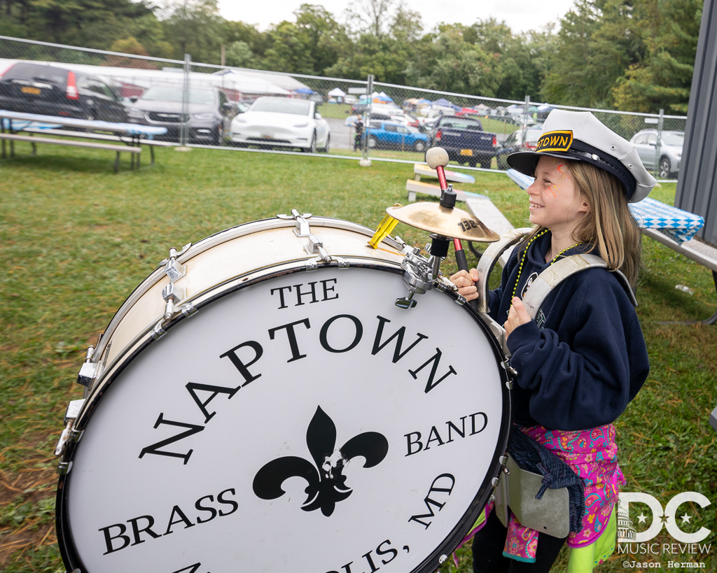 A young fan sits in with The Naptown Brass Band (for a quick second)