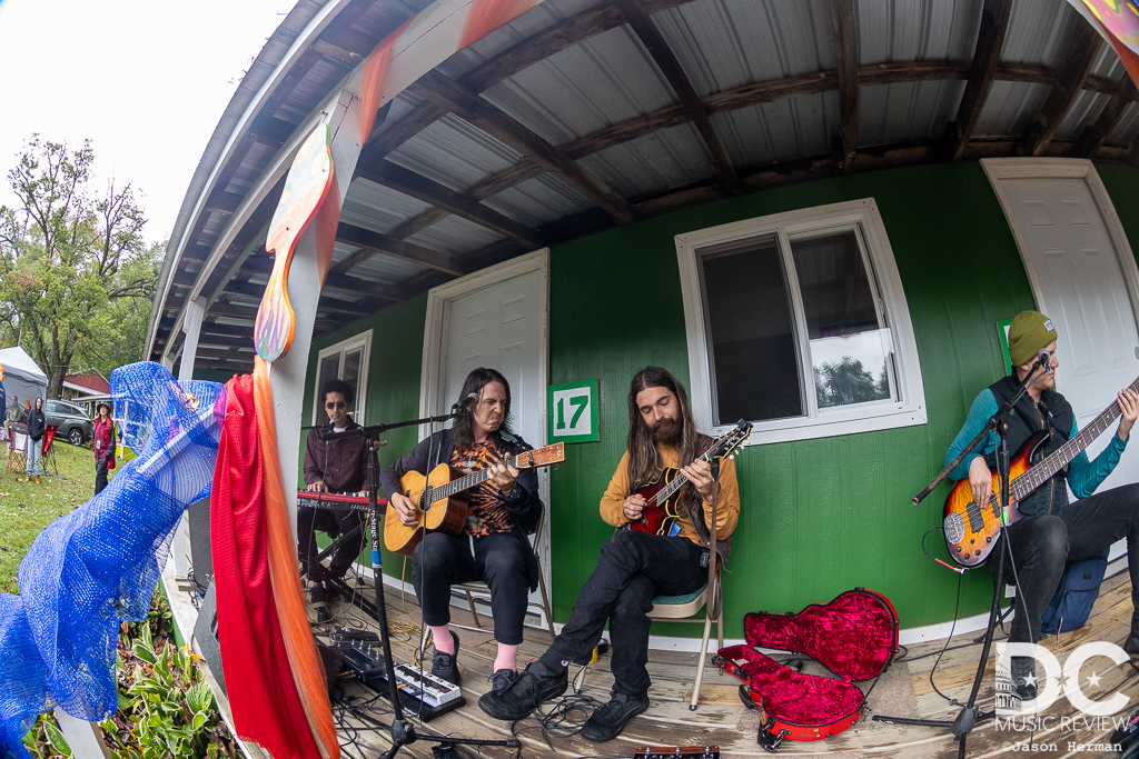 Magic Beans perform a secret acoustic set in front of their cabin