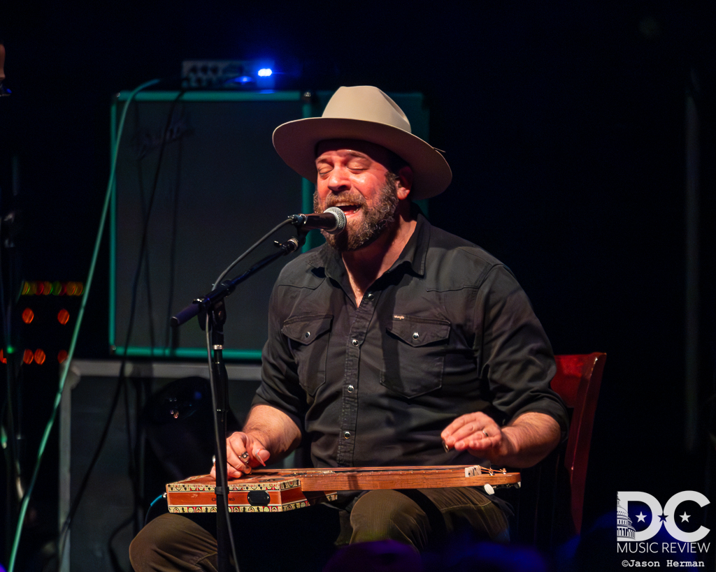 Cris Jacobs and his trusted cigar box guitar